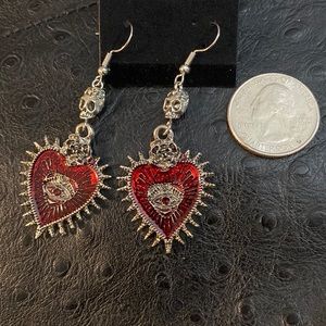 Silver and red skull and heart w/ evil eye dangling earrings